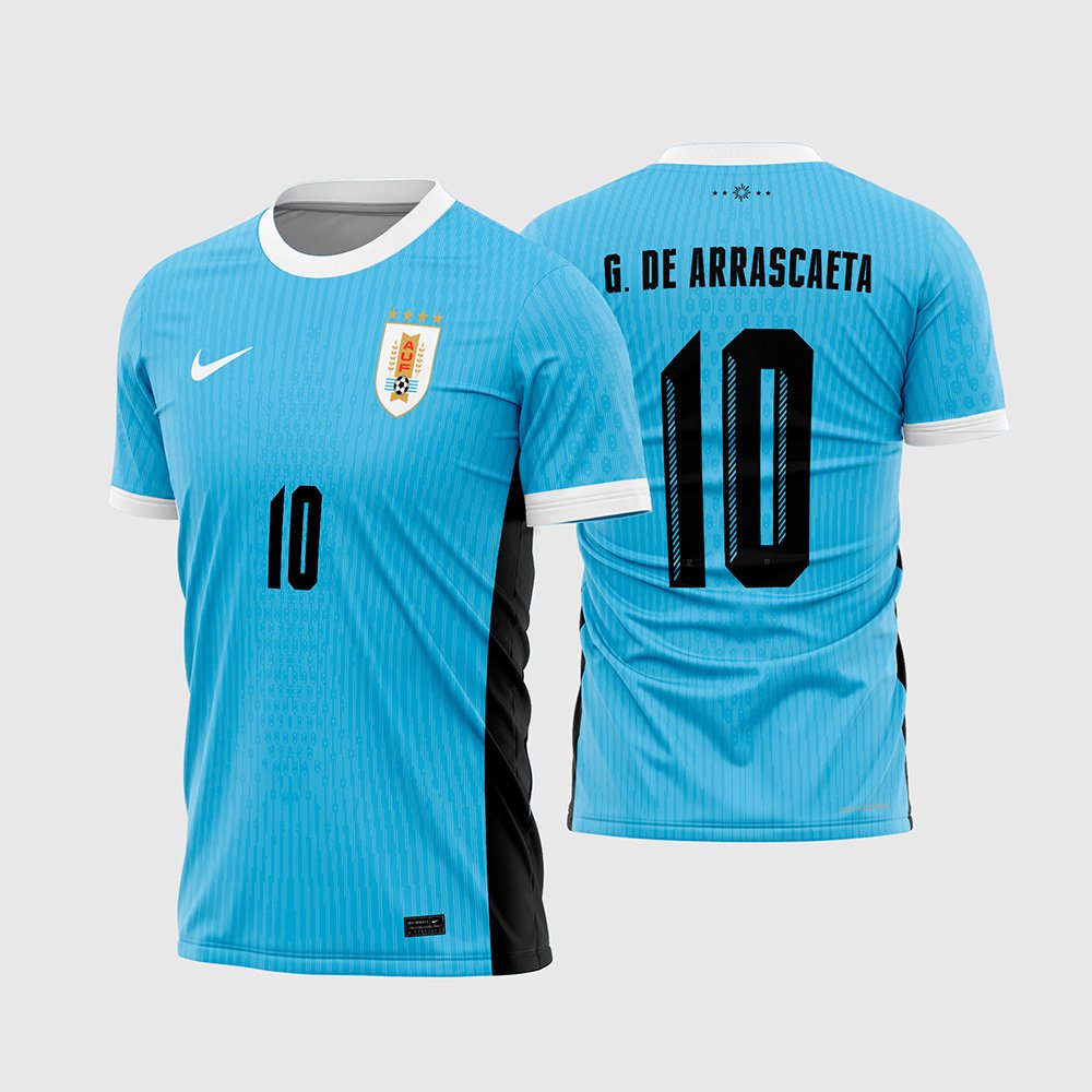 Arte Vetor Camisa Uruguai Titular 2024 - 2025.jpg apresenta o mockup do fardamento titular da seleção do Uruguai na cor azul celeste com marcas d'água de texturas em linhas verticais, escudo oficial da AUF com quatro estrelas, gola e punhos brancos, painéis pretos nas laterais, e numeração esportiva preta exibindo o nome G. De Arrascaeta nas costas em sublimação total CorelDRAW.